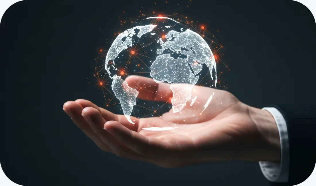 A hand holding a glowing digital earth, symbolising distance healing across the world